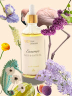 ESSENCE Kropsolie vist som en del af et naturligt kropsplejesæt. Viser rene, plantebaserede olier designet til at forbedre hudens struktur.