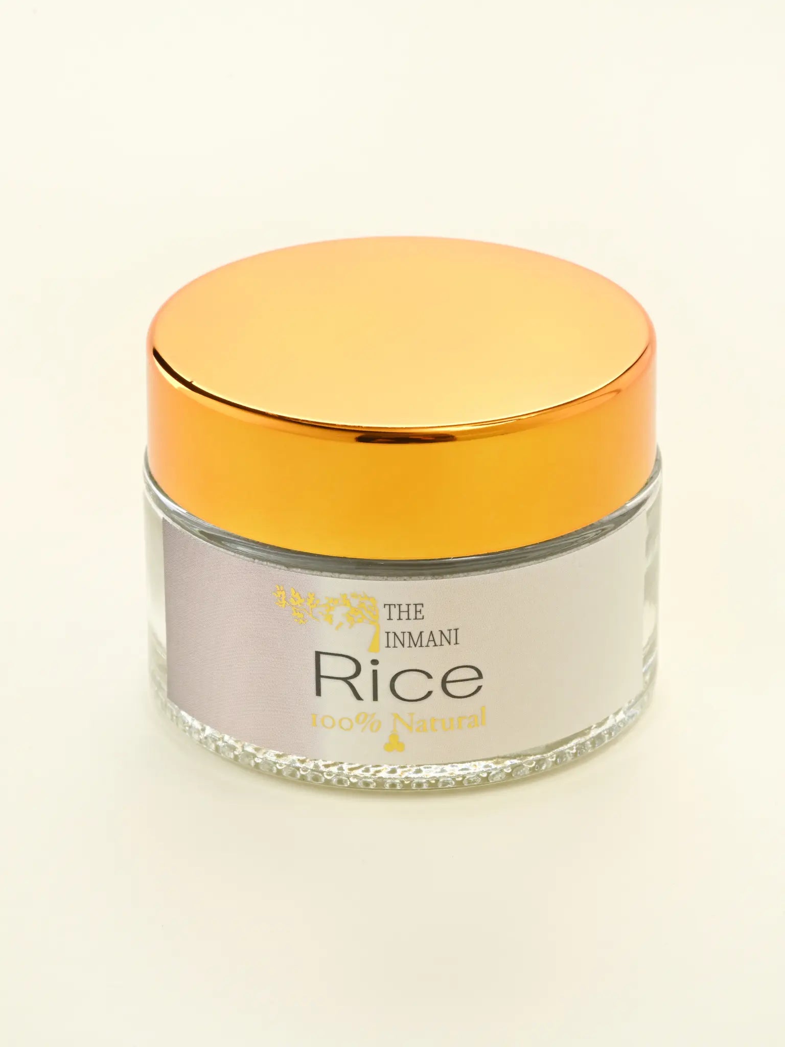 THE INMANI Rice Mineralsk Ansigtsmaske i emballage. En naturlig pulvermaske baseret på rismel og hvidt ler, skabt til at forfine og udglatte hudens overflade.