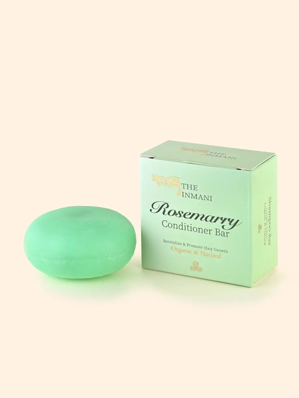 THE INMANI Rosemary Balsam Bar. En fast og naturlig conditioner bar beriget med rosmarinolie og arganolie, designet til at styrke svækket hår uden silikone.